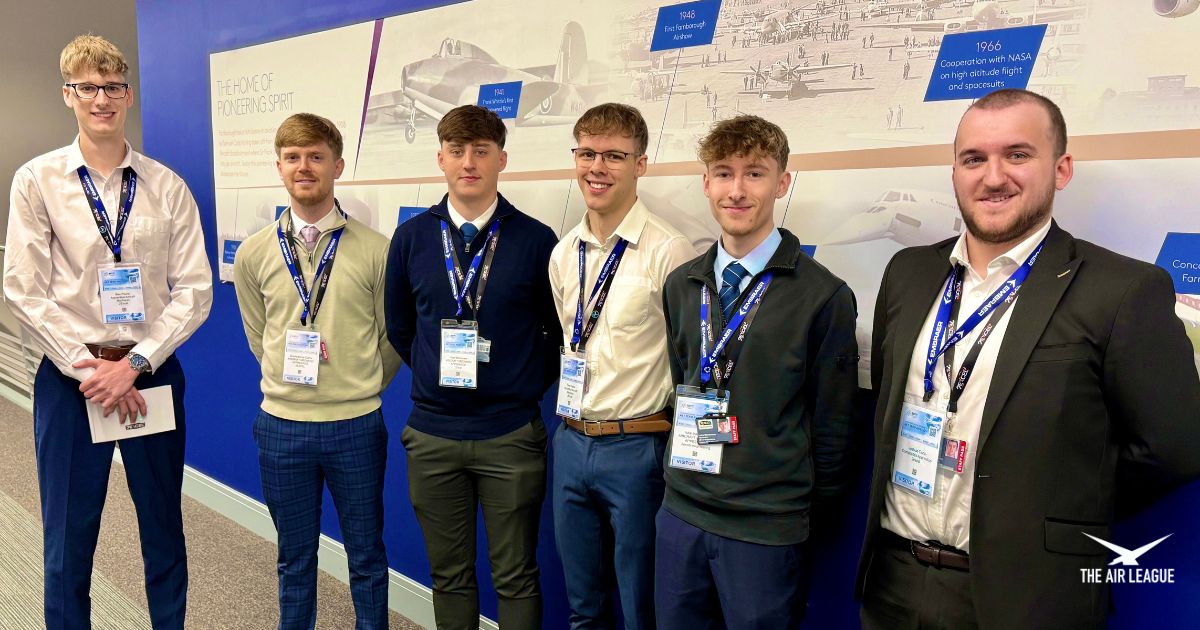 six young men standing against a graphic background